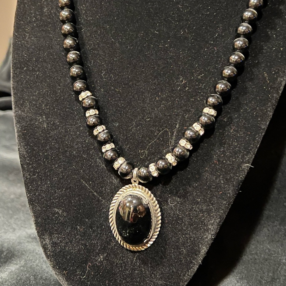 Silver & Black Pendant Necklace 17”   Some rhinestone wheels near main bauble.